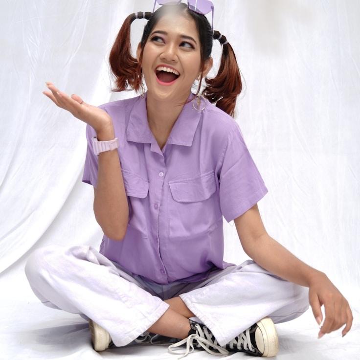 Asha Rao, Lead Design Curator at DawnForestMingle, reviewing corporate floral arrangements